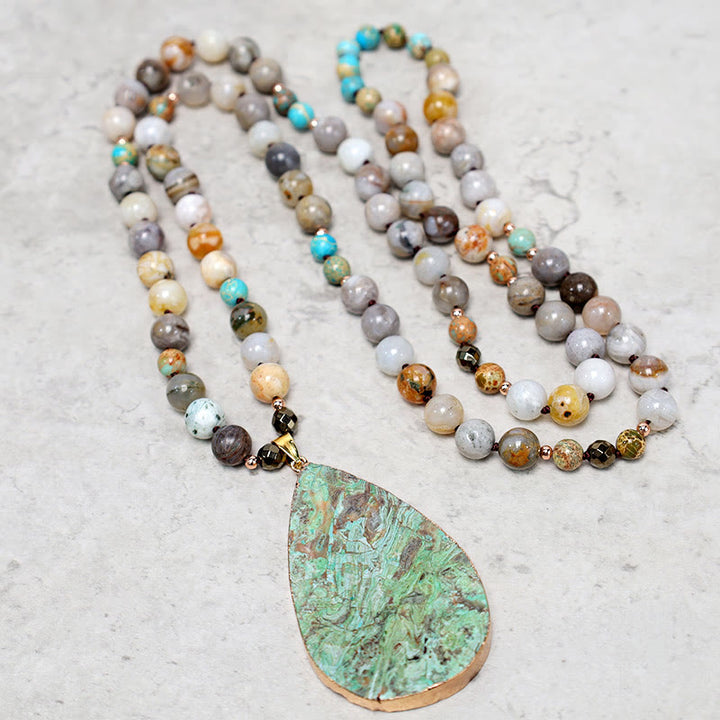 Collana di perline di guarigione in diaspro Picasso naturale dell'oceano Buddha Stones - image 0