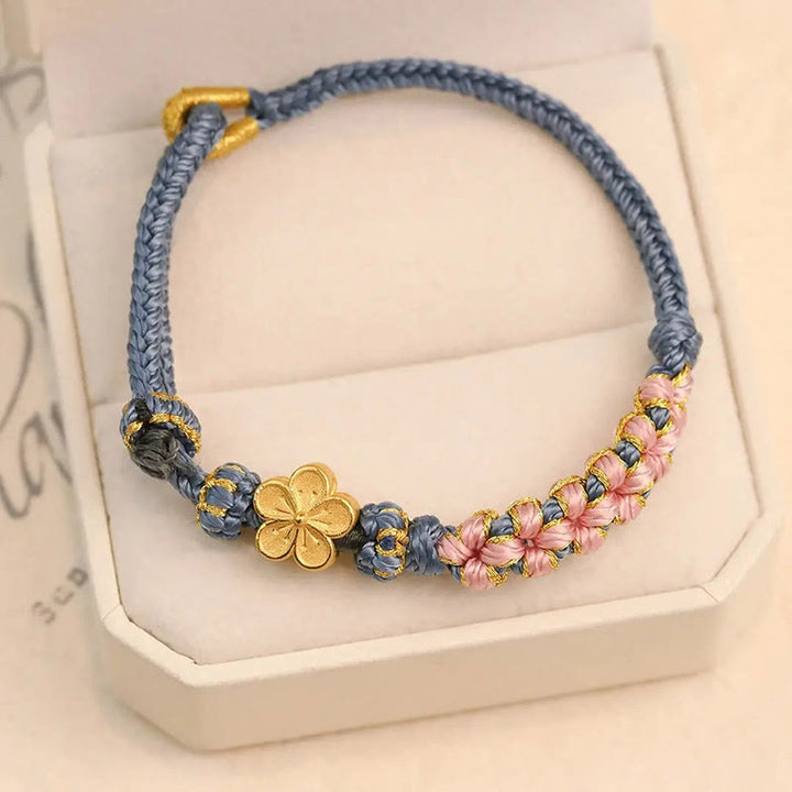 Braccialetto con corda della ricchezza con motivo a fiori di pesco