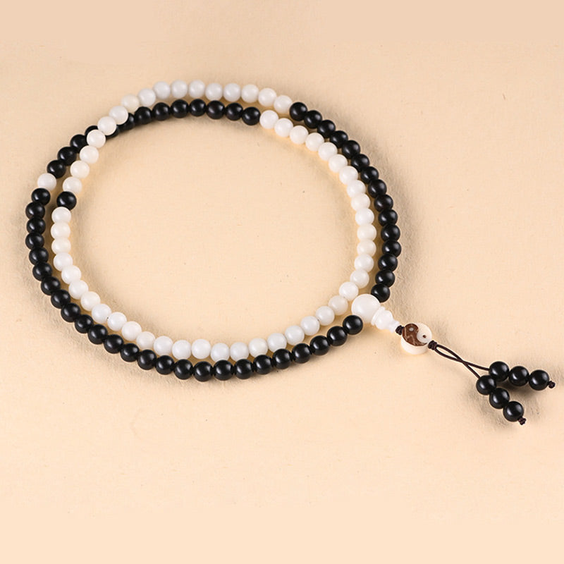 Collana Mala con protezione YinYang in ebano e Buddha Stones