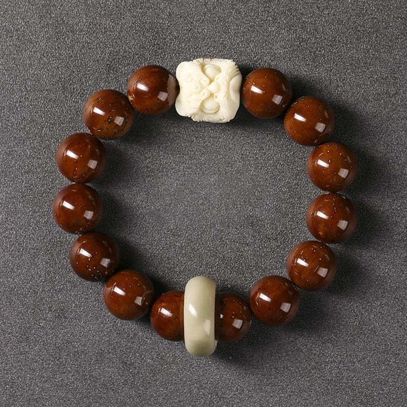 Braccialetto della saggezza del leone danzante dei semi di Bodhi viola Buddha Stones