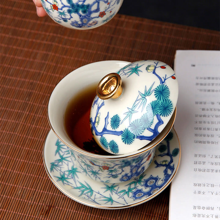 Buddha Stones Retro Prugna Fiore Pino Bambù Fenice Kirin Ceramica Gaiwan Sancai Tazza da tè Kung Fu Tazza da tè e piattino con coperchio