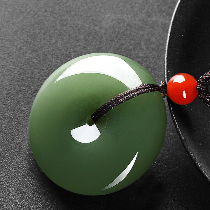 Collana con ciondolo a corda con fibbia della pace in giada rotonda naturale Buddha Stones