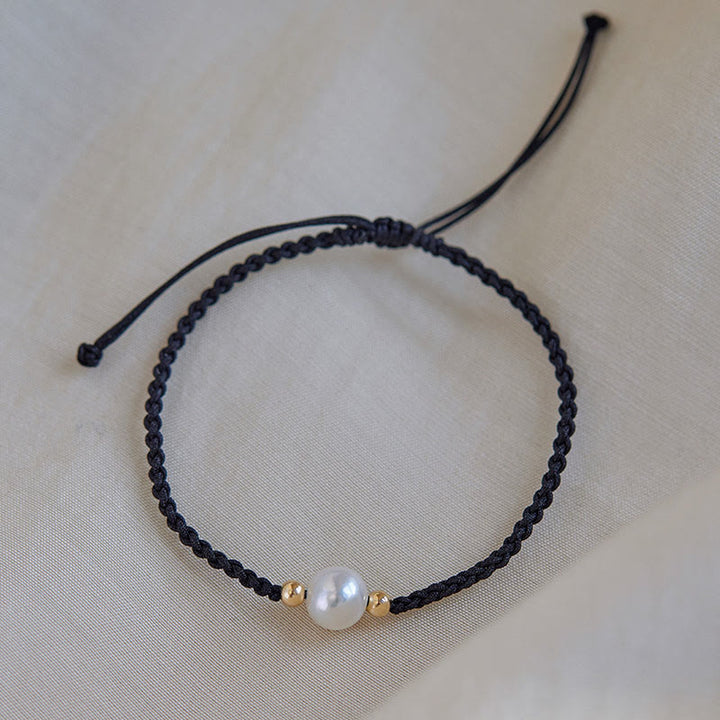 Braccialetto con treccia di perle naturali Buddha Stones Luck String