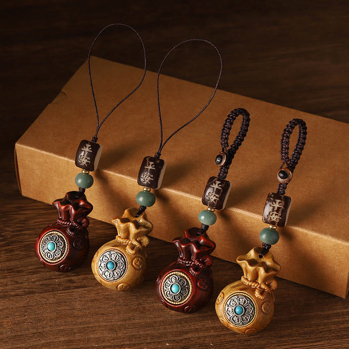 Buddha Stones Piccola foglia Sandalo rosso Sandalo verde Borsa per soldi Om Mani Padme Hum Portachiavi di protezione girevole Decorazione da appendere al telefono - image 1