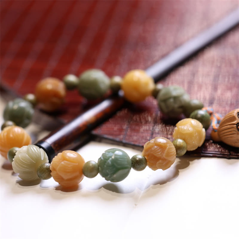 Braccialetto di armonia della saggezza del sandalo verde del seme di Bodhi Buddha Stones