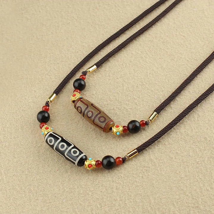 Buddha Stones Tibetano Nove Occhi Dzi Bead Protezione Benedizioni Collana Pendente - image 13