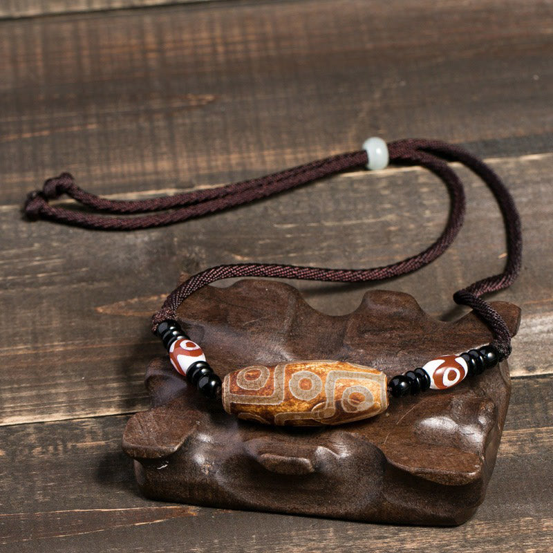 Buddha Stones Collana di perline tibetane Dzi a nove occhi con cordino protettivo - image 8