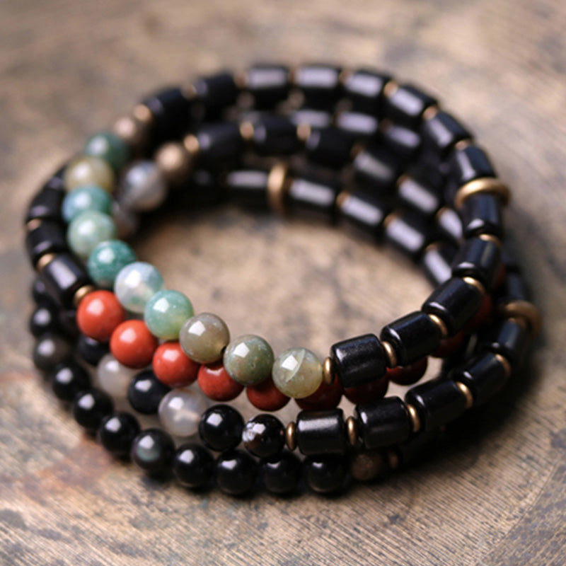 Braccialetto di coppia di pace in rame con Buddha Stones, legno di ebano, diaspro rosso, agata muschiata e cristallo