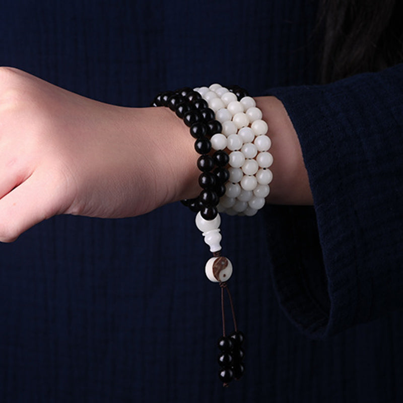Collana Mala con protezione YinYang in ebano e Buddha Stones