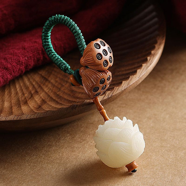 Buddha Stones Loto Naturale Bianco Bodhi Seme Legno di Pesca Fortuna Portachiavi Decorazione - image 0