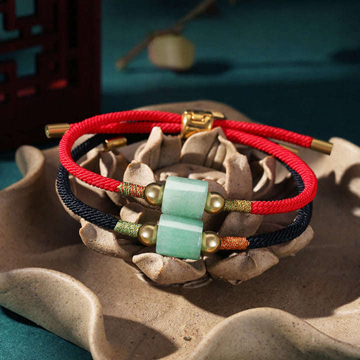 Braccialetto in corda intrecciata con protezione dalla fortuna in malachite, fatto a mano in Tibet, con Buddha Stones verde e pietra rossa