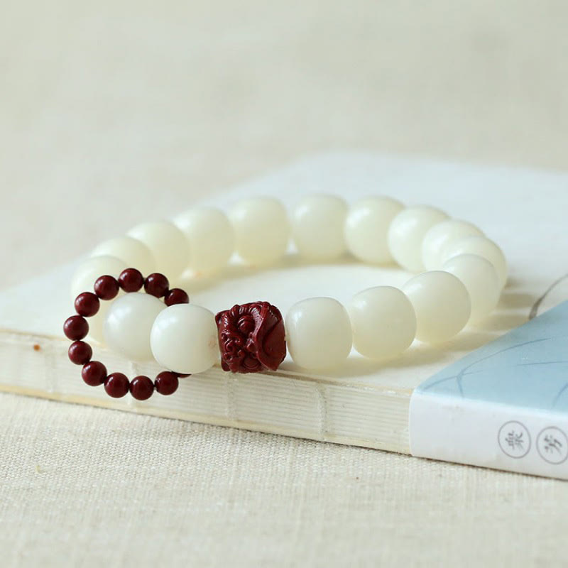 Buddha Stones Semi di Bodhi naturale Cinabro Leone danzante Charm Saggezza Armonia Polso Mala - image 1