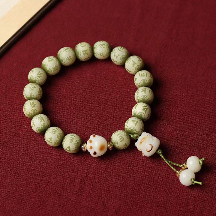 Buddha Stones Semi di Bodhi verdi Zampa di gatto Om Mani Padme Hum Braccialetto della saggezza inciso - image 2