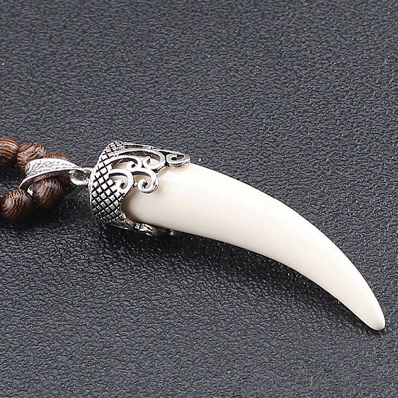 Collana con ciondolo in stile corno in pietra turchese e legno wenge, protezione e meditazione - image 9