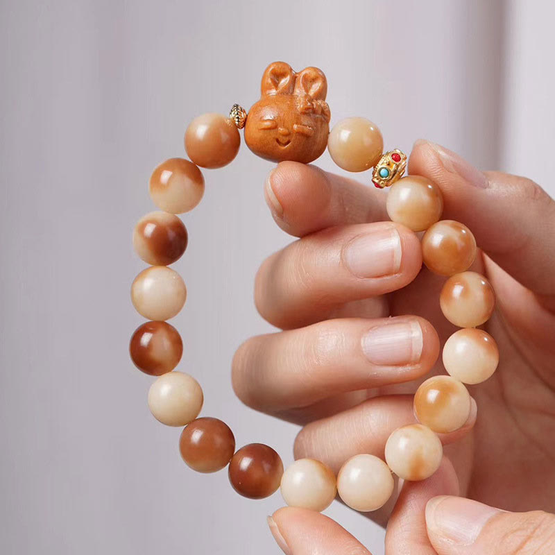 Braccialetto di pace con coniglio e semi di Bodhi naturali Buddha Stones