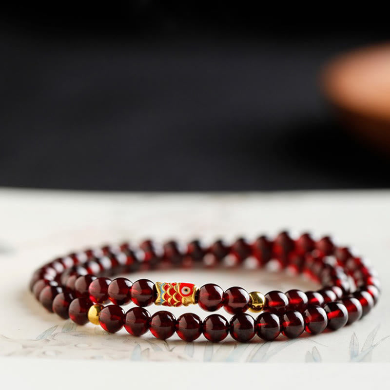 Braccialetto di protezione in granato naturale con pesce koi in oro 999 Buddha Stones - image 16
