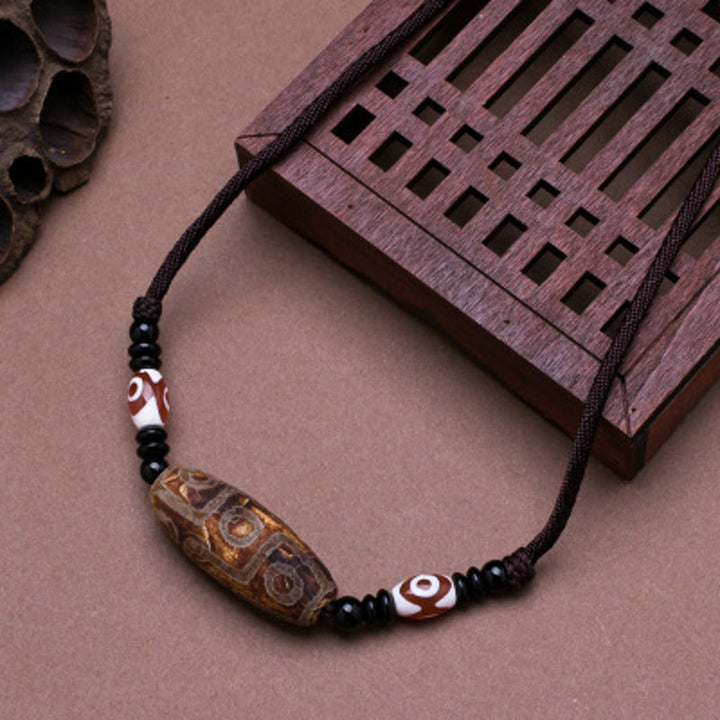 Buddha Stones Collana di perline tibetane Dzi a nove occhi con cordino protettivo - Marrone - image 7