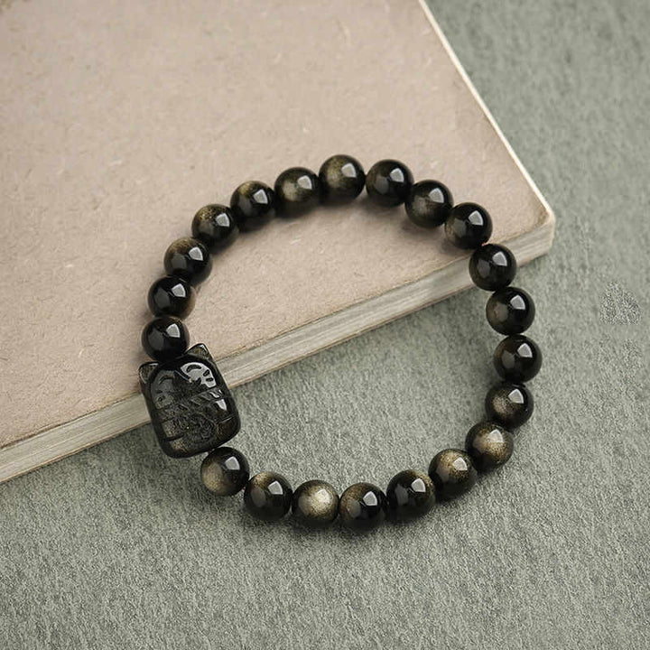 Braccialetto di protezione con gatto portafortuna e zampa adorabile , Buddha Stones, ossidiana lucida d'oro, ossidiana lucida d'argento - Ossidiana lucente dorata - Gatto fortunato - 8 millimetri - image 19