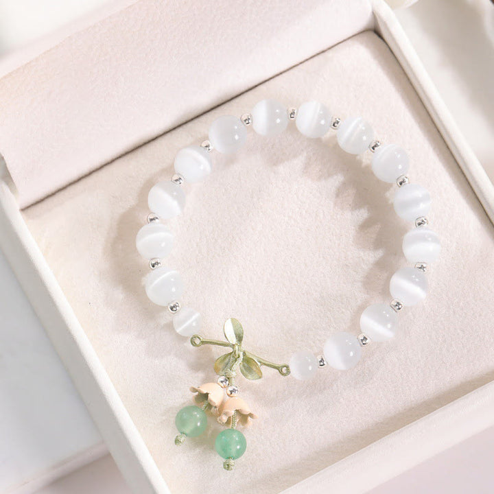 Bracciale con ciondolo Buddha Stones Cat's Eye, Aventurina verde, Calcedonio blu, Cristallo rosa, Orchidea della pace - Occhio di gatto e avventurina verde - image 0