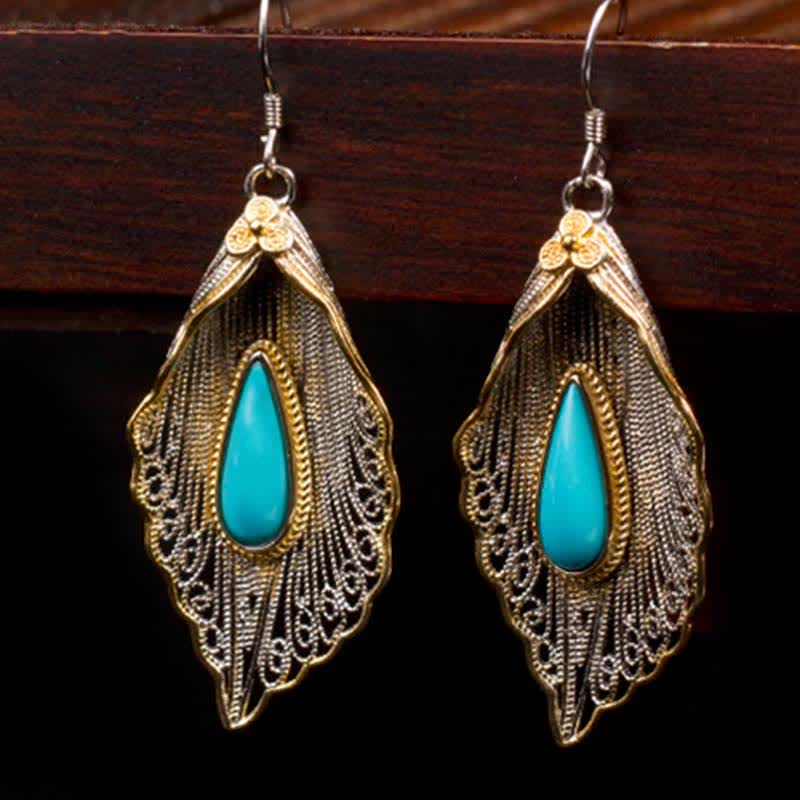 Orecchini pendenti con motivo a foglia di Bodhi in argento sterling 925 con Buddha Stones e turchese
