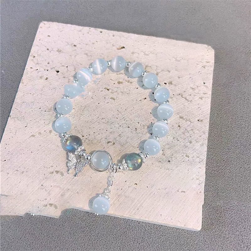 Braccialetto di supporto con ciondolo a forma di stella a forma di farfalla, pietra di luna e occhio di gatto Buddha Stones - image 7