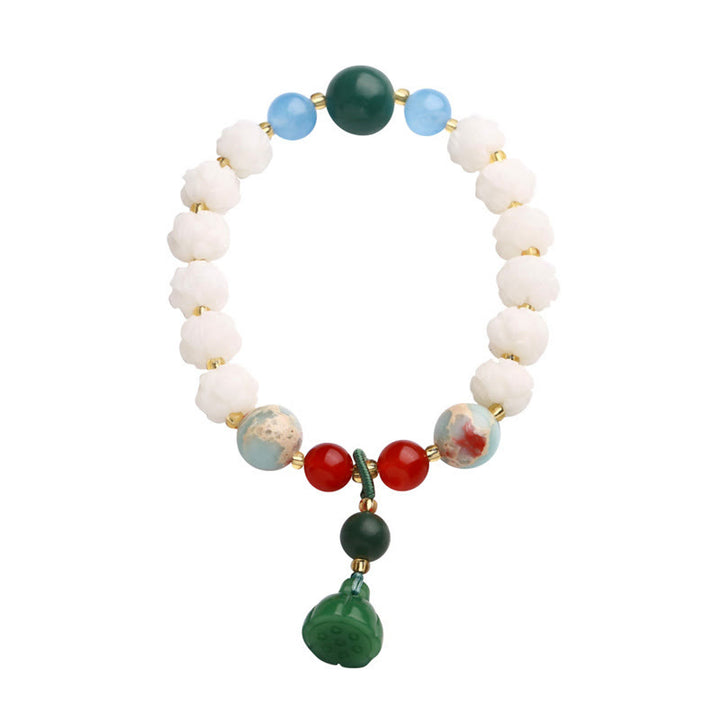 Braccialetto di armonia di pace intagliato con Buddha Stones