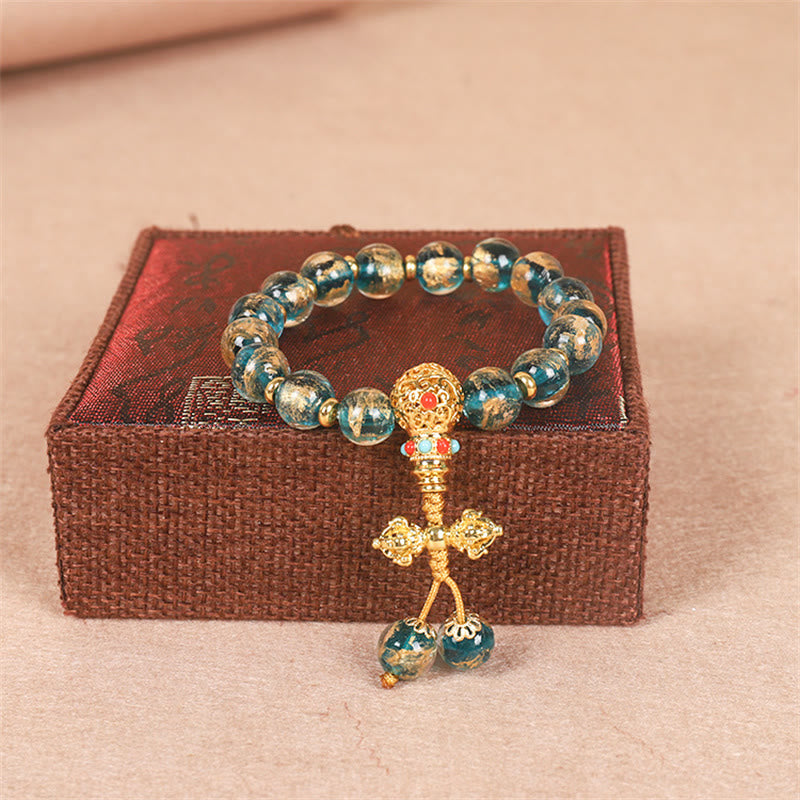Buddha Stones Tibetan Gold Deglutizione Bestia Famiglia Dorje Vajra Forza Braccialetto di Perline