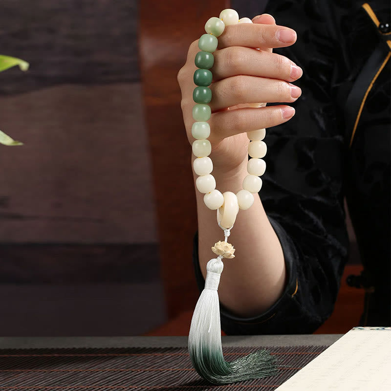 Buddha Stones Naturale Gradiente Bodhi Seed Fortuna Sacchetto di Denaro Loto Saggezza Nappa Polso Mala