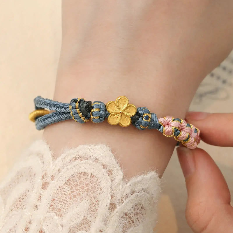 Braccialetto con corda della ricchezza con motivo a fiori di pesco