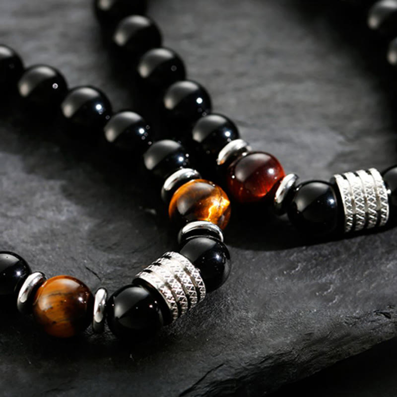 Bracciale Buddha Stones in ossidiana nera naturale con occhio di tigre e forza - image 2