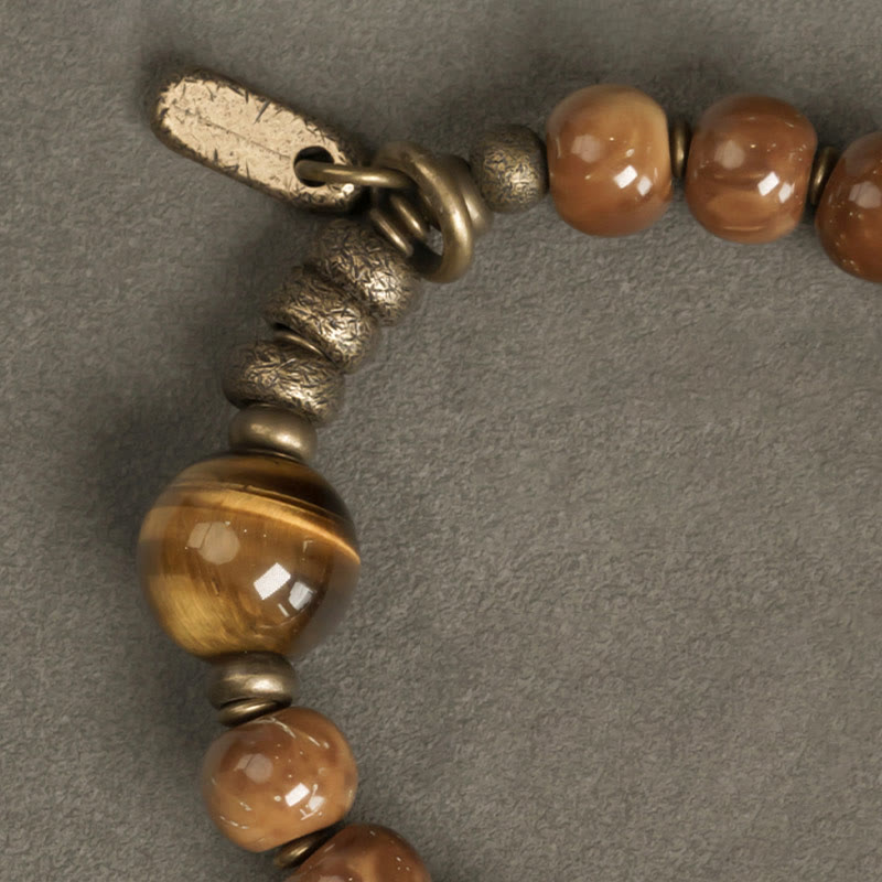 Braccialetto per la fortuna, in ottone, rame e ossidiana , Buddha Stones , semi di Kuka, occhio di tigre e oro lucido - image 11