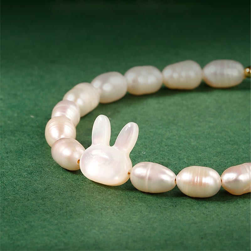 Braccialetto di sincerità con coniglio carino e perle naturali Buddha Stones