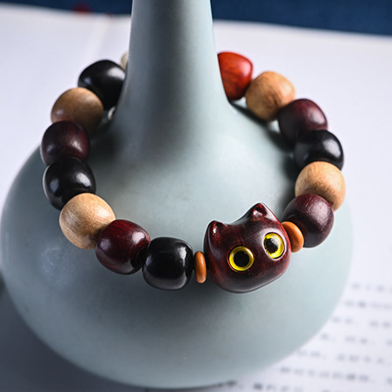 Braccialetto di protezione con incisione di gatto carino in legno di sandalo rosso e ebano con piccole foglie Buddha Stones - image 13