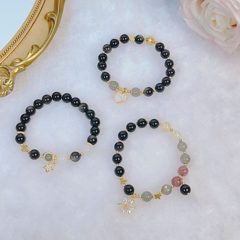 Braccialetto di protezione con cuore, stella e fiore in ossidiana naturale con Buddha Stones argento lucido
