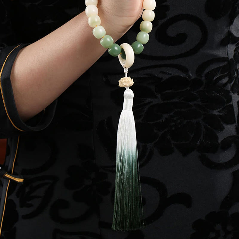 Buddha Stones Naturale Gradiente Bodhi Seed Fortuna Sacchetto di Denaro Loto Saggezza Nappa Polso Mala