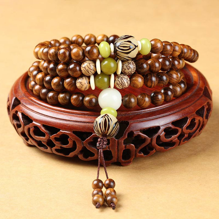 Braccialetto di protezione e calma Mala in palissandro tibetano Buddha Stones - 10mm*108 - image 0