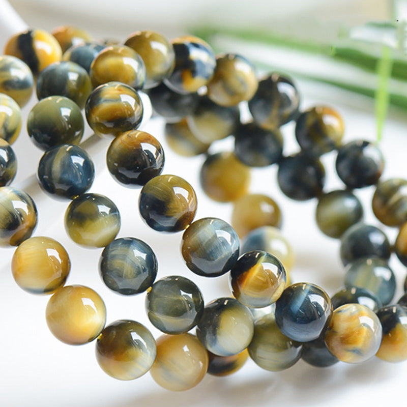 Braccialetto di protezione e forza con occhio di tigre Buddha Stones