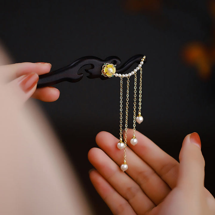 Buddha Stones Legno di ebano Fiore giallo Perla Nappe Forcina per capelli