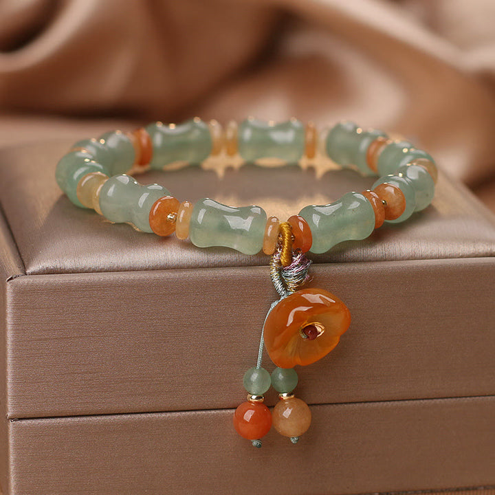 Braccialetto della fortuna con motivo a fiori di bambù e giada naturale Buddha Stones