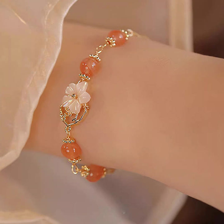 Braccialetto Buddha Stones Red Agate Tridacna Stone Flower Confidence