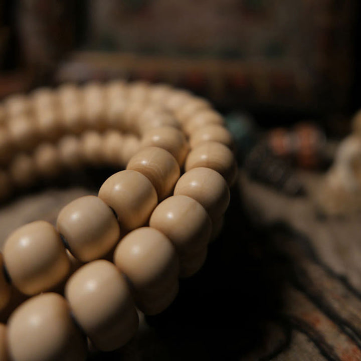 Buddha Stones 108 Mala Perle Abelia Biflora Legno Allontanando gli Spiriti Maligni Polso Mala