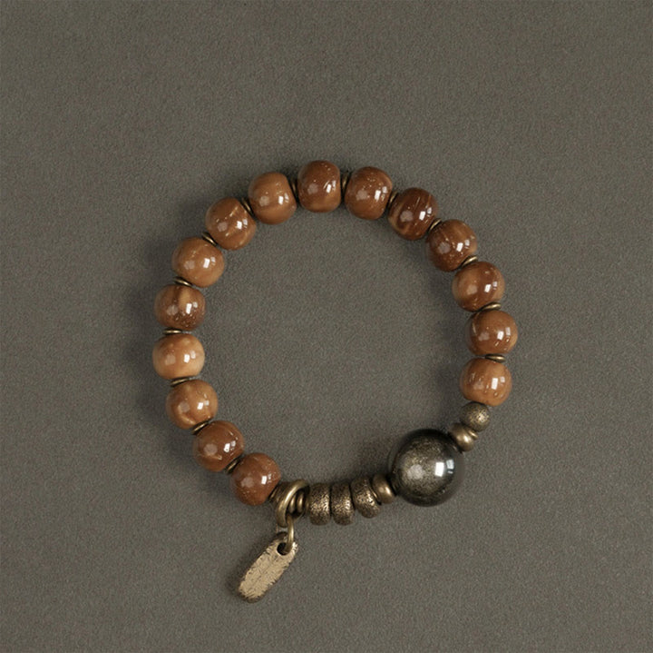 Braccialetto per la fortuna, in ottone, rame e ossidiana , Buddha Stones , semi di Kuka, occhio di tigre e oro lucido - image 9