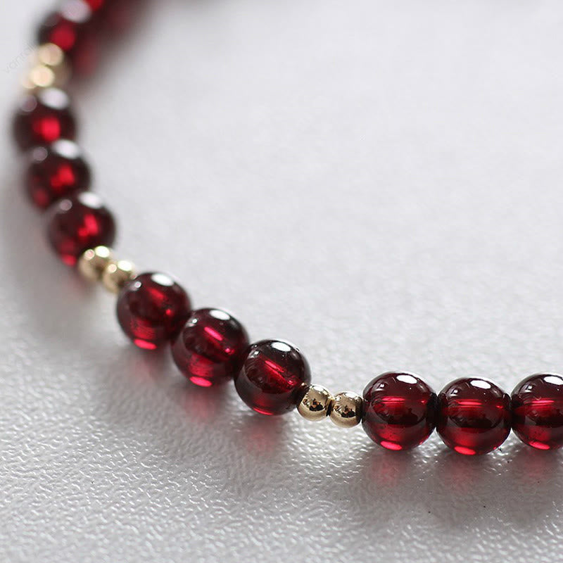 Bracciale Buddha Stones in lega placcata oro 14K con granato naturale e calma - image 4