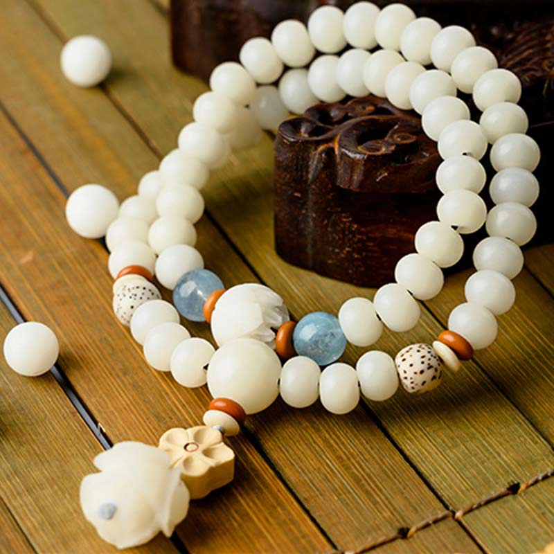 Braccialetto di benedizione del loto Bodhi in giada bianca tibetana Buddha Stones