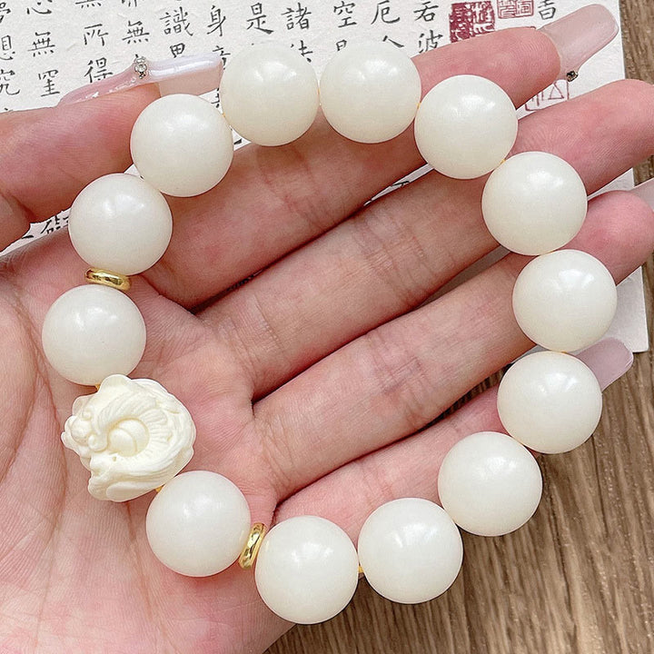 Braccialetto di protezione con leone danzante , Buddha Stones di avorio, seme di Bodhi, pietre di Buddha, argento lucido e ossidiana
