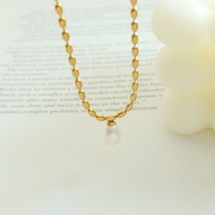 Collana con ciondolo di perle e perle della pace