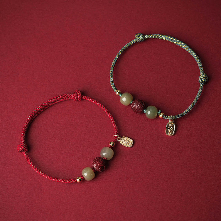 Braccialetto di corda artigianale Buddha Stones in giada Hetian placcato oro 14K, cinabro e loto portafortuna - image 1