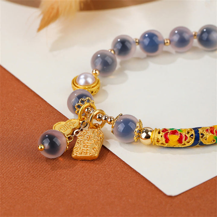 Braccialetto di forza con amuleto in agata blu caramella naturale Buddha Stones