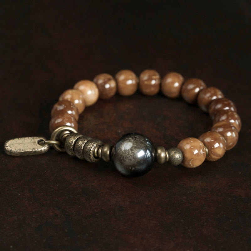 Braccialetto per la fortuna, in ottone, rame e ossidiana , Buddha Stones , semi di Kuka, occhio di tigre e oro lucido - image 8