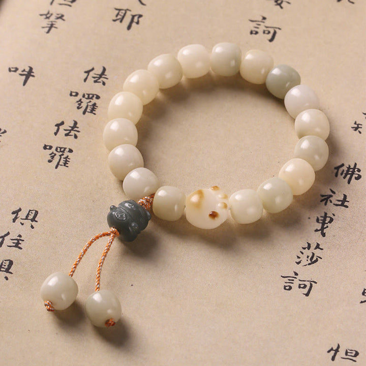 Braccialetto della pace con zampa di gatto, seme di Bodhi, pietre di Buddha Stones e gatto fortunato - Bodhi Seed Green Cat - image 1